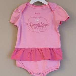 Reebok Saskatchewan Roughriders pink short sleeved onesie/bodysuit